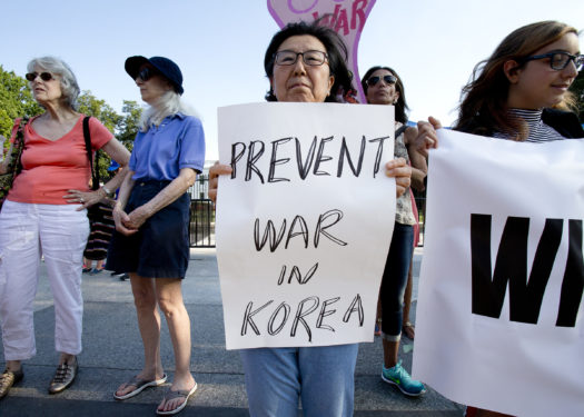Nuclear war protesters demonstrate outside the White House in Washington Aug. 9. Church officials called for dialogue to ease U.S.-North Korea tensions. (CNS photo/Tyler Orsburn)