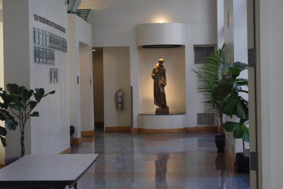 Statue of St. Francis of Assisi in the St. Francis College hallway where the informational meeting took place.