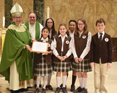 Students Recognized at Mission Sunday Mass
