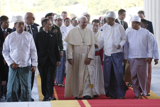 Pope Francis walks with Myanmar's President Htin Kyaw as he arrives for a courtesy visit in the presidential palace in Naypyitaw, Myanmar, Nov. 28. (CNS photo/Paul Haring) 