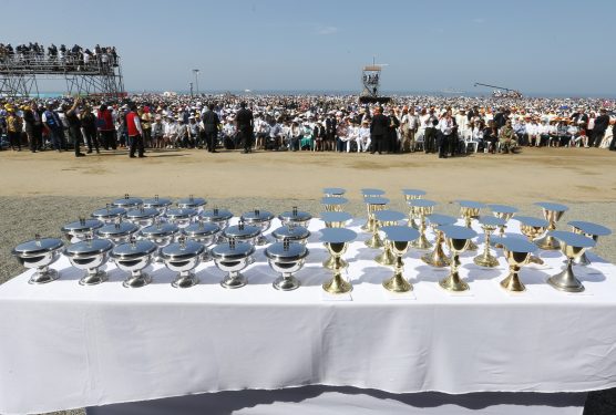 Ciboriums and chalices for the Eucharist are pictured before Pope Francis celebrates Mass at the beach in Huanchaco, Peru, Jan. 20. (CNS photo/Paul Haring)