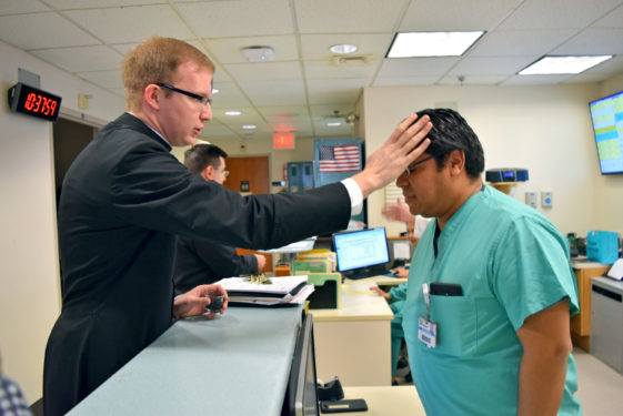 On Ash Wednesday, seminarian Brendon Harfmann, visited Calvary Hospital in Sunset Park to distribute ashes to patients and staff members, including an impromptu visit to ambulatory care staff at NYU Langone Hospital.