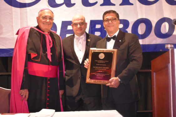 Below, Bishop Nicholas DiMarzio and Cathedral Club President Antonio Biondi present guest of honor awards to Nicholas R. Caiazzo