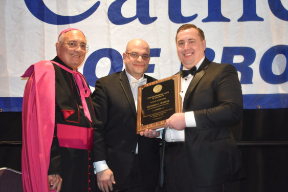 Bishop Nicholas DiMarzio and Cathedral Club President Antonio Biondi present guest of honor awards to Stephen C. Winter.