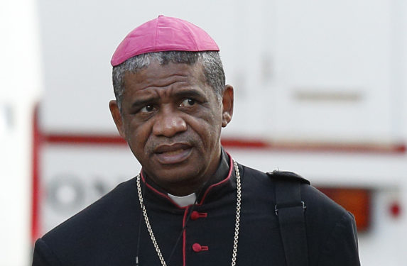 Archbishop Desire Tsarahazana of Toamasina, Madagascar, arrives for a session of the extraordinary Synod of Bishops on the family at the Vatican in this Oct. 16, 2014, file photo. Archbishop Tsarahazana was one of 14 new cardinals named by Pope Francis May 20. (CNS photo/Paul Haring) 