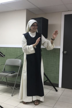 Sister Heidi gives her talk to the teens.