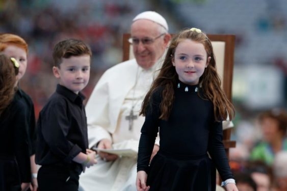 Pope Francis greets children during the Festival of Families in Croke Park stadium in Dublin Aug. 25. (CNS photo/Paul Haring)