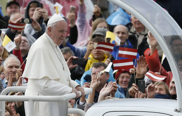 Pope Francis greets the crowd before celebrating Mass Sept. 24 at the Shrine of the Mother of God in Aglona, Latvia. (CNS photo/Paul Haring) 