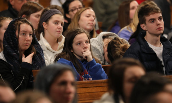 Young people listen to the homily during the closing Mass of the National Prayer Vigil for Life Jan. 18 at the Basilica of the National Shrine of the Immaculate Conception in Washington. (Photo: Catholic News Service/Bob Roller)