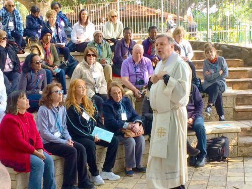 Msgr. Harrington preaches a homily for the diocesan contingent at the site of Peter's Primacy overlooking the Sea of Galilee.