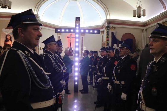 Polish cadets and lighted cross