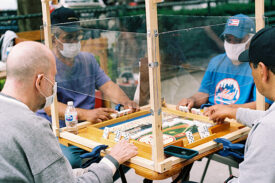 How the Game of Dominoes Is Building a Close Family From a Social Distance