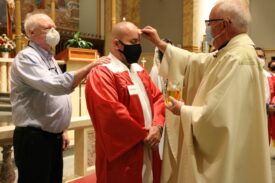 Pandemic Can’t Stop Adults From Receiving Sacraments
