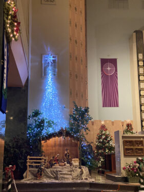 Our Lady of Lourdes Church nativity by the altar.