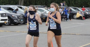 Local CHSAA Track Teams Grin and ‘Bear’ the Cold