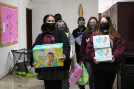 St. Saviour HS Club Gifts New Moms With Early Mother’s Day Gifts
