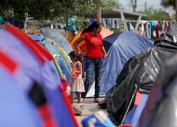 Judge Blocks Texas Order on Immigrants, Allows Catholic Charities to Work