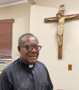 Only In Print: Priest Who Serves at Home in Nigeria,  Has ‘Summered’ in Queens Since ’96