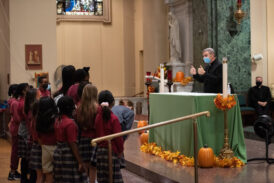 St. Saviour Students Welcome Bishop Brennan With Songs, Smiles