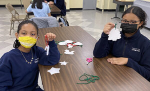 Bright Christmas: Students Helping Out Kids At Our Lady of the Snows