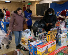 Volunteer ‘Santa’s Elves’ Join CCBQ To Give Christmas Joy to Needy Children