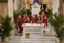 Bishop Brennan and Procession Took ‘Faith Into the Streets’ on Palm Sunday