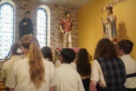 Queens Catholic Academy Students Are Surrounded By Images of the Sainthood-Bound Teen