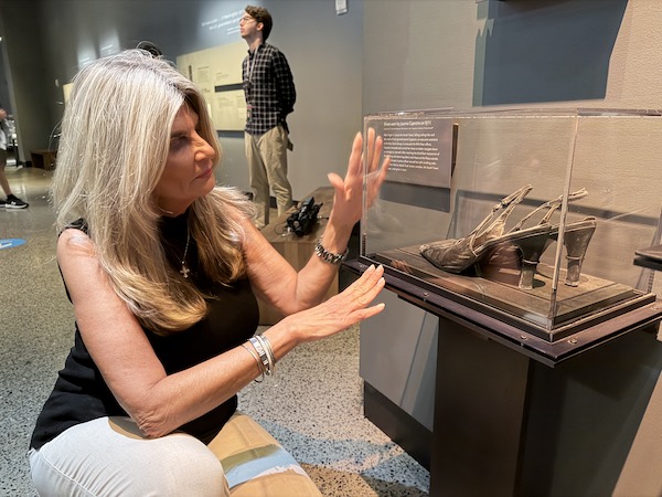9/11 Survivor’s High Heels Carry Her Story of Escape and Faith Into History